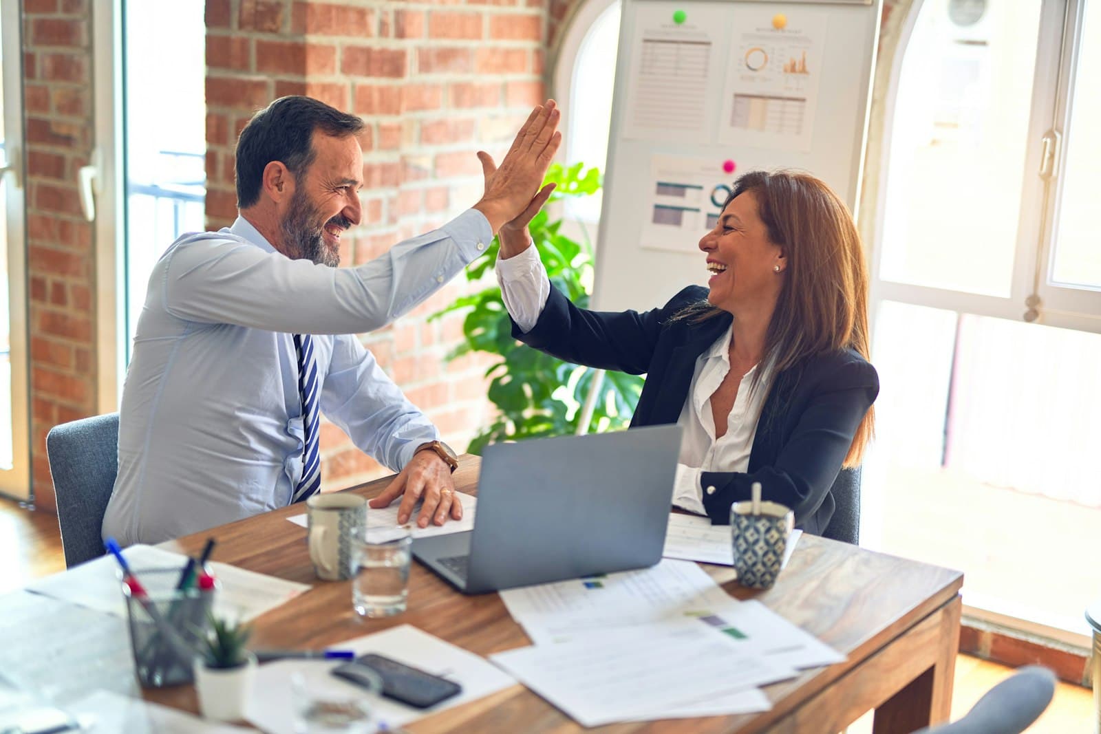 Consultants working through a growth plan with a client
